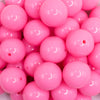 close up view of a pile of 20mm Flamingo Pink Solid Bubblegum Beads