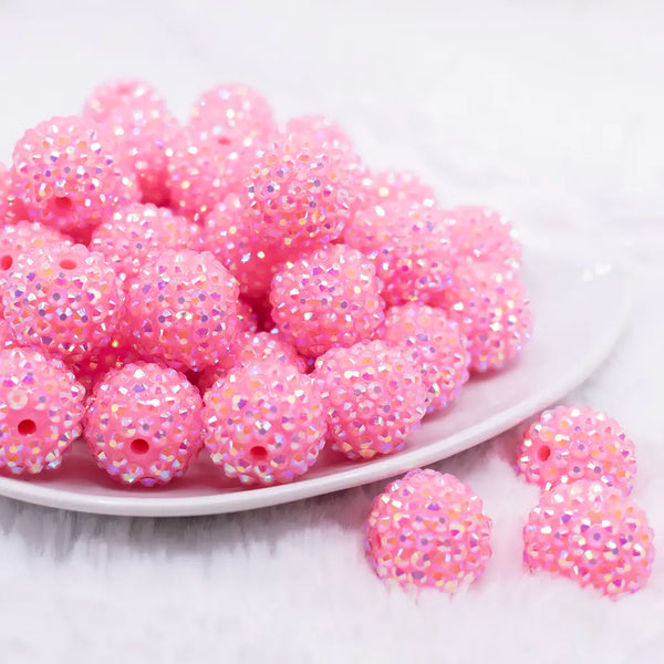 front view of a pile of 20mm Flamingo Pink Rhinestone AB Bubblegum Beads
