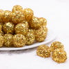 front view of a pile of 20mm Gold Sequin Confetti Bubblegum Beads