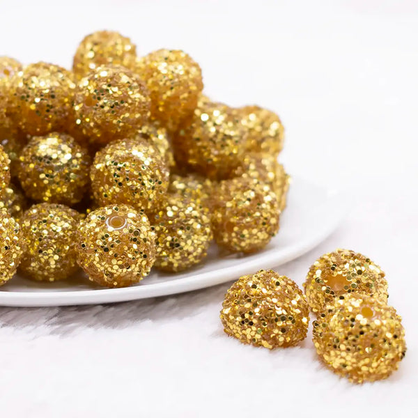 front view of a pile of 20mm Gold Sequin Confetti Bubblegum Beads