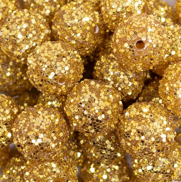 close up view of a pile of 20mm Gold Sequin Confetti Bubblegum Beads