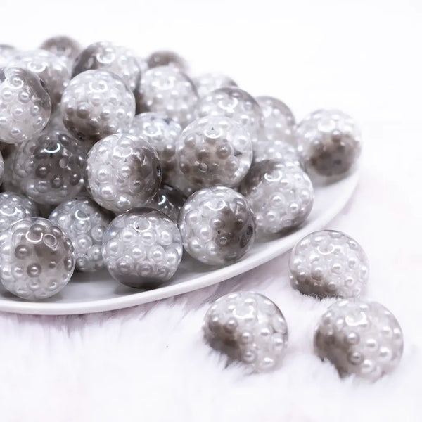 front view of a pile of 20mm Gray Captured Pearls Bubblegum Bead