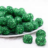 front view of a pile of 20mm Christmas Green Sequin Confetti Bubblegum Beads