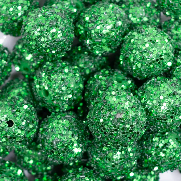 close up view of a pile of 20mm Christmas Green Sequin Confetti Bubblegum Beads