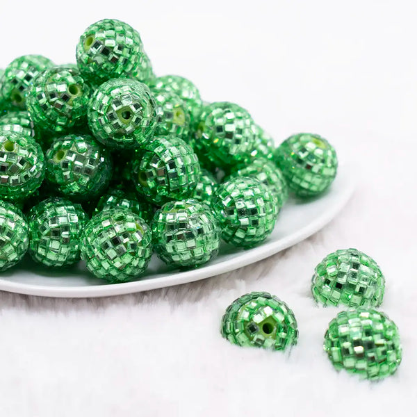 front view of a pile of 20mm Green Mirror Disco Faceted Bubblegum Beads