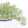 front view of a pile of 20mm Lime Green Flaked Flower Bubblegum Bead