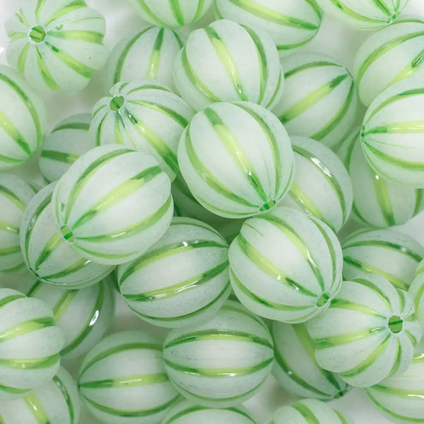 close up view of a pile of 20mm Green Frosted Pumpkin Shaped Bubblegum Bead