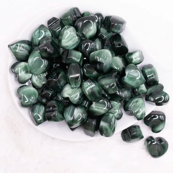 top view of a pile of 20mm Green Opal Heart Shaped Acrylic Beads