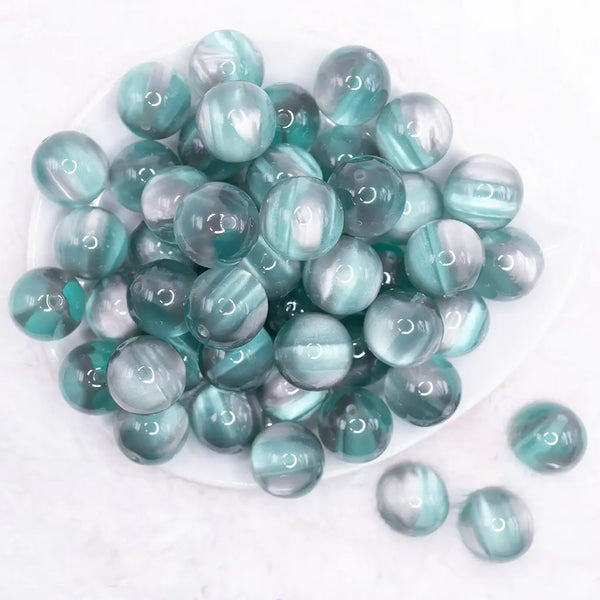 top view of a pile of 20mm Green Illusion Glitter Bubblegum Bead