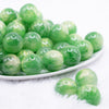 front view of a pile of 20mm Green Luster Bubblegum Beads