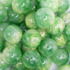 close up view of a pile of 20mm Green Luster Bubblegum Beads