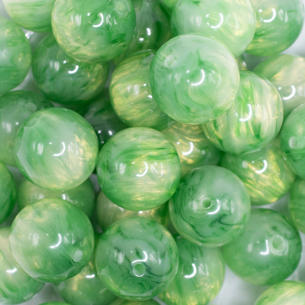close up view of a pile of 20mm Green Luster Bubblegum Beads