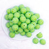 top view of a pile of 20mm Green Luster Rhinestone AB Bubblegum Beads