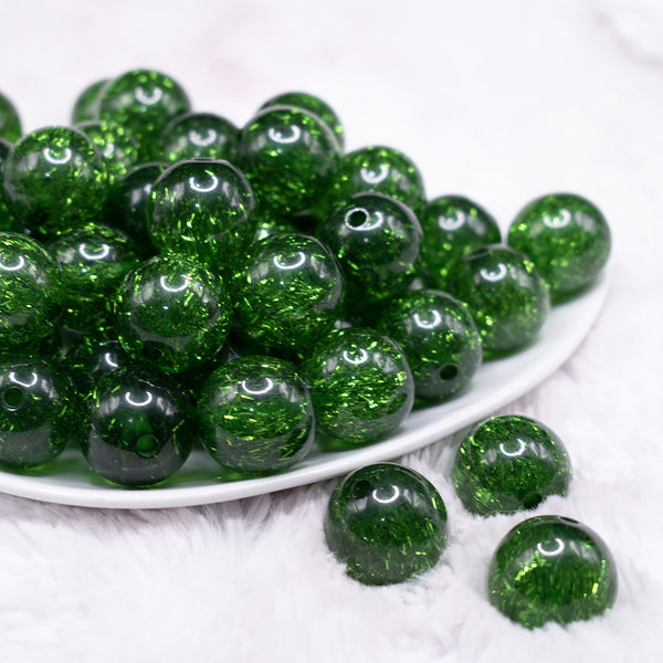 front view of a pile of 20mm Green Glitter Tinsel Bubblegum Beads