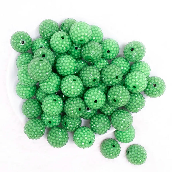 top view of a pile of 20mm Green with Clear Rhinestone Bubblegum Beads