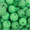 close up view of a pile of 20mm Green with Clear Rhinestone Bubblegum Beads