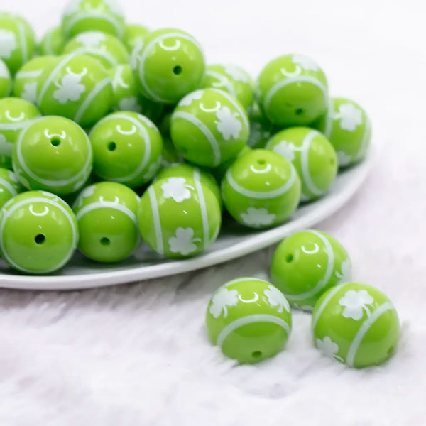 front view of a pile of 20mm White Shamrock on Green Acrylic Bubblegum Beads