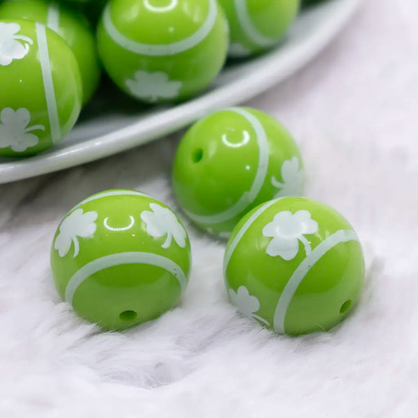 macro view of a pile of 20mm White Shamrock on Green Acrylic Bubblegum Beads