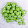 top view of a pile of 20mm White Shamrock on Green Acrylic Bubblegum Beads