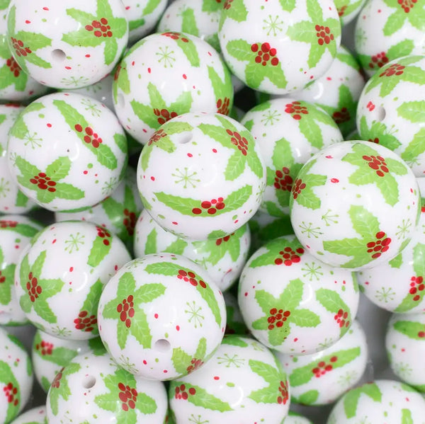 close up view of a pile of 20mm Holly Print Acrylic Bubblegum Beads