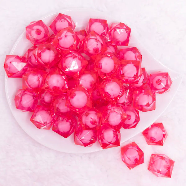 top view of a pile of 20mm Hot Pink Transparent Faceted Cube with Bead Bubblegum Beads