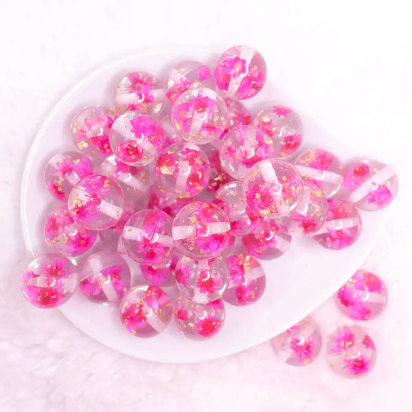 top view of a pile of 20mm Hot Pink Flaked Flower Bubblegum Bead