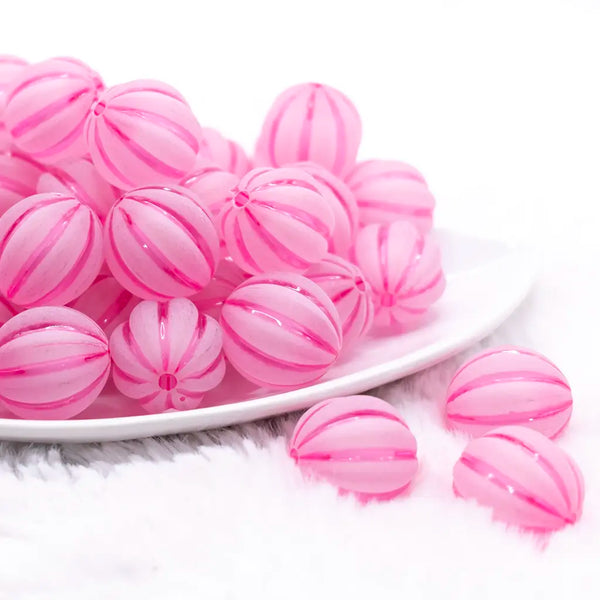 front view of a pile of 20mm Hot Pink Frosted Pumpkin Shaped Bubblegum Bead