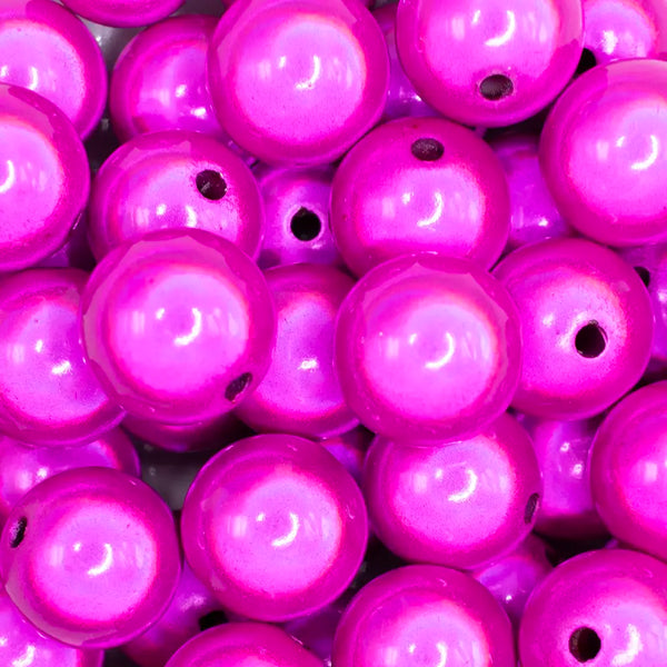close up view of a pile of 20mm Hot Pink Miracle Bubblegum Bead