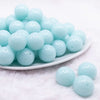 front view of a pile of 20mm Ice Blue Solid Bubblegum Beads