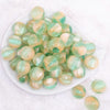 top view of a pile of 20mm Light Green Illusion Glitter Bubblegum Bead