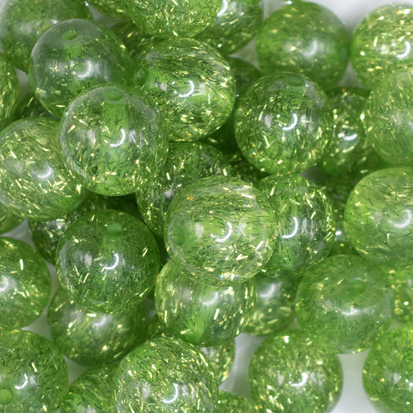 close up view of a pile of 20mm Lime Green Glitter Tinsel Bubblegum Beads