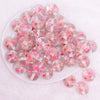 top view of a pile of 20mm Light Pink Flaked Flower Bubblegum 