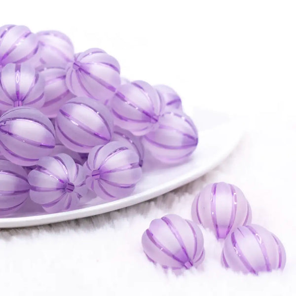 front view of a pile of 20mm Light Purple Frosted Pumpkin Shaped Bubblegum Bead