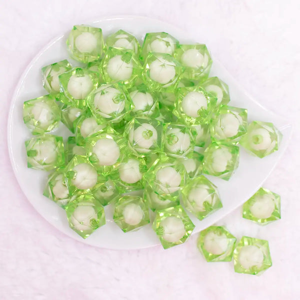 top view of a pile of 20mm Lime Green Transparent Cube with Middle Bubblegum Beads