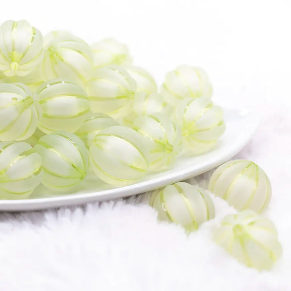 front view of a pile of 20mm Lime Green Frosted Pumpkin Shaped Bubblegum Bead