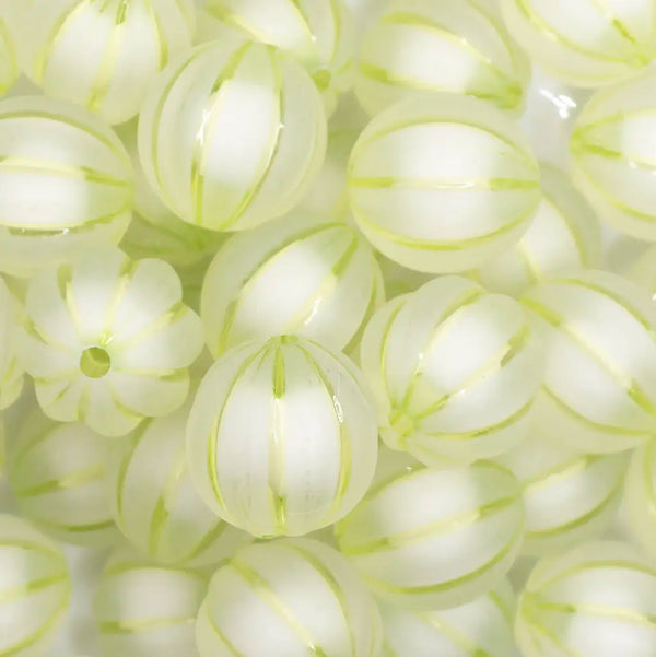 close up view of a pile of 20mm Lime Green Frosted Pumpkin Shaped Bubblegum Bead