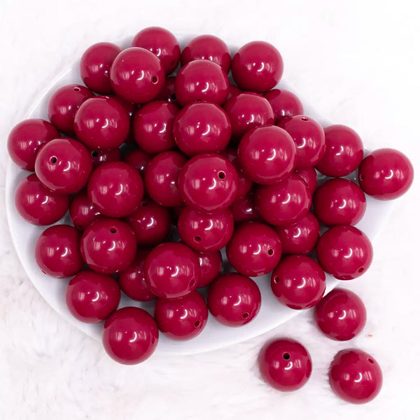 top view of a pile of 20mm Marroon Red Solid Bubblegum Beads