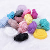 front view of a pile of mixed 20mm Rose Silicone Focal Beads
