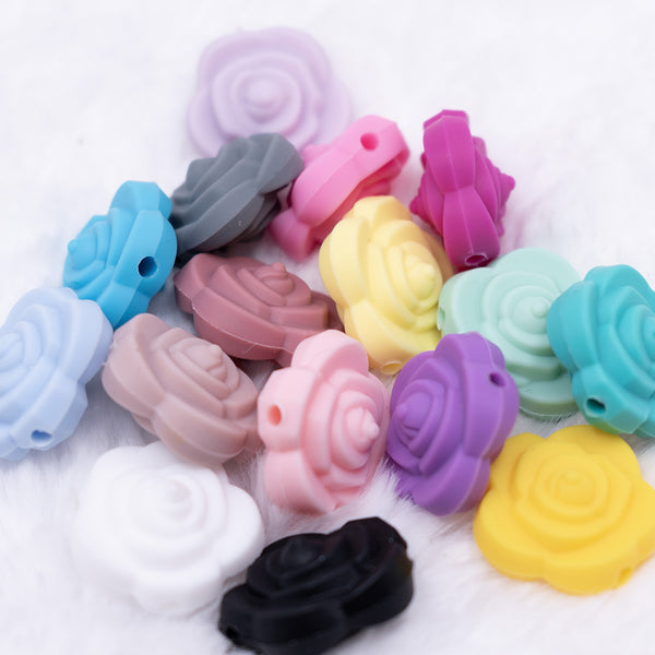 top view of a pile of mixed 20mm Rose Silicone Focal Beads