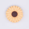 top view of a mustard 20mm Silicone Daisy Focal Beads