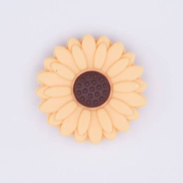 top view of a mustard 20mm Silicone Daisy Focal Beads