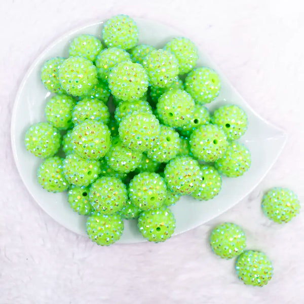 top view of a pile of 20mm Neon Lime Green Rhinestone AB Bubblegum Beads