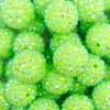 close up view of a pile of 20mm Neon Lime Green Rhinestone AB Bubblegum Beads