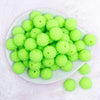 top view of a pile of 20mm Lime Green Neon with Clear Rhinestone Bubblegum Beads