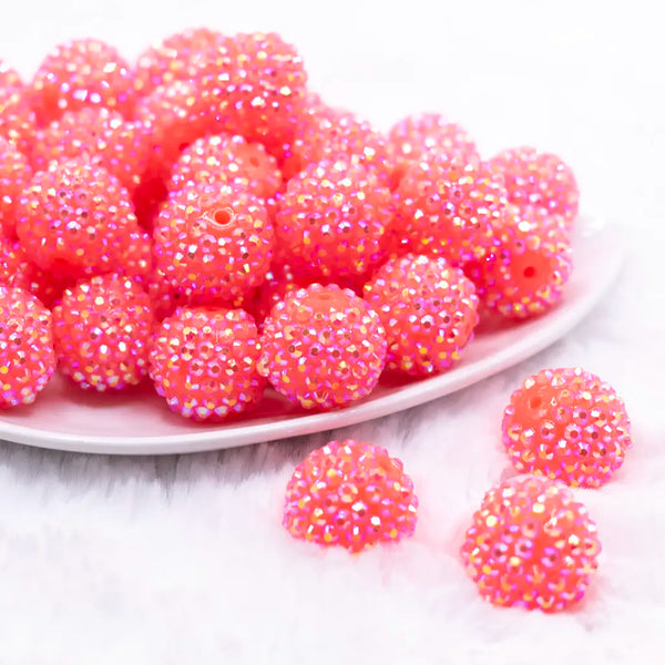 front view of a pile of 20mm Bright Neon Pink Rhinestone AB Bubblegum Beads
