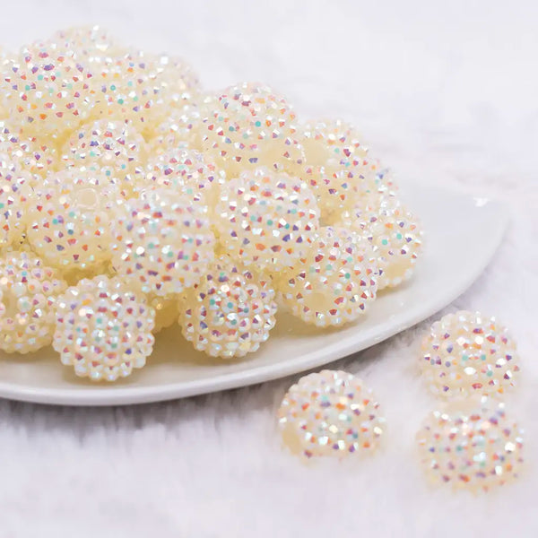 front view of a pile of 20mm Off White Jelly Rhinestone AB Bubblegum Beads