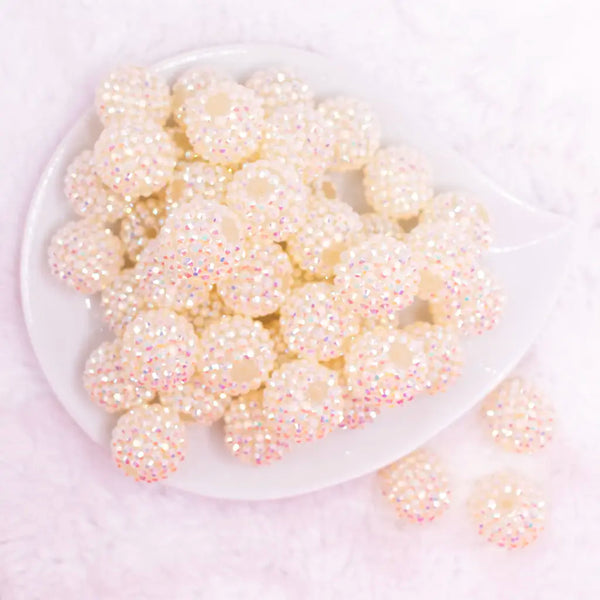 top view of a pile of 20mm Off White Jelly Rhinestone AB Bubblegum Beads