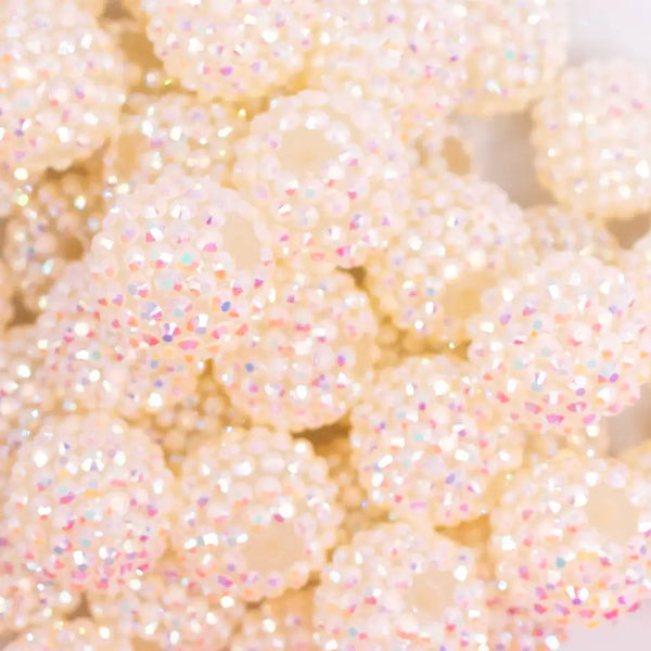 close up view of a pile of 20mm Off White Jelly Rhinestone AB Bubblegum Beads