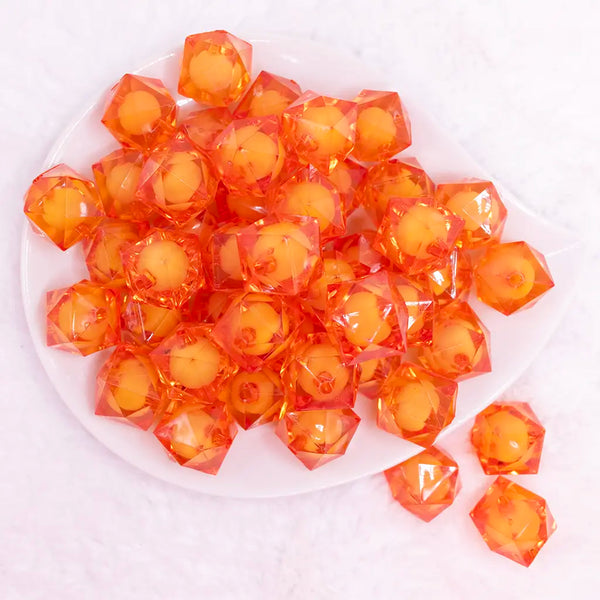 top view of a pile of 20mm Orange Transparent Cube with Middle Bubblegum Beads