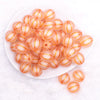 top view of a pile of 20mm Orange Frosted Pumpkin Shaped Bubblegum Bead